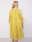 Шелковое платье от New Grinta желтого цвета 