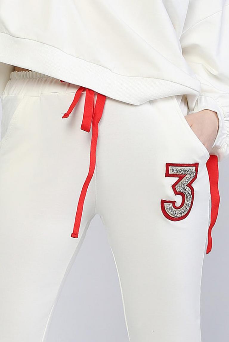 Тонкие эластичные брюки Glamour белого цвета