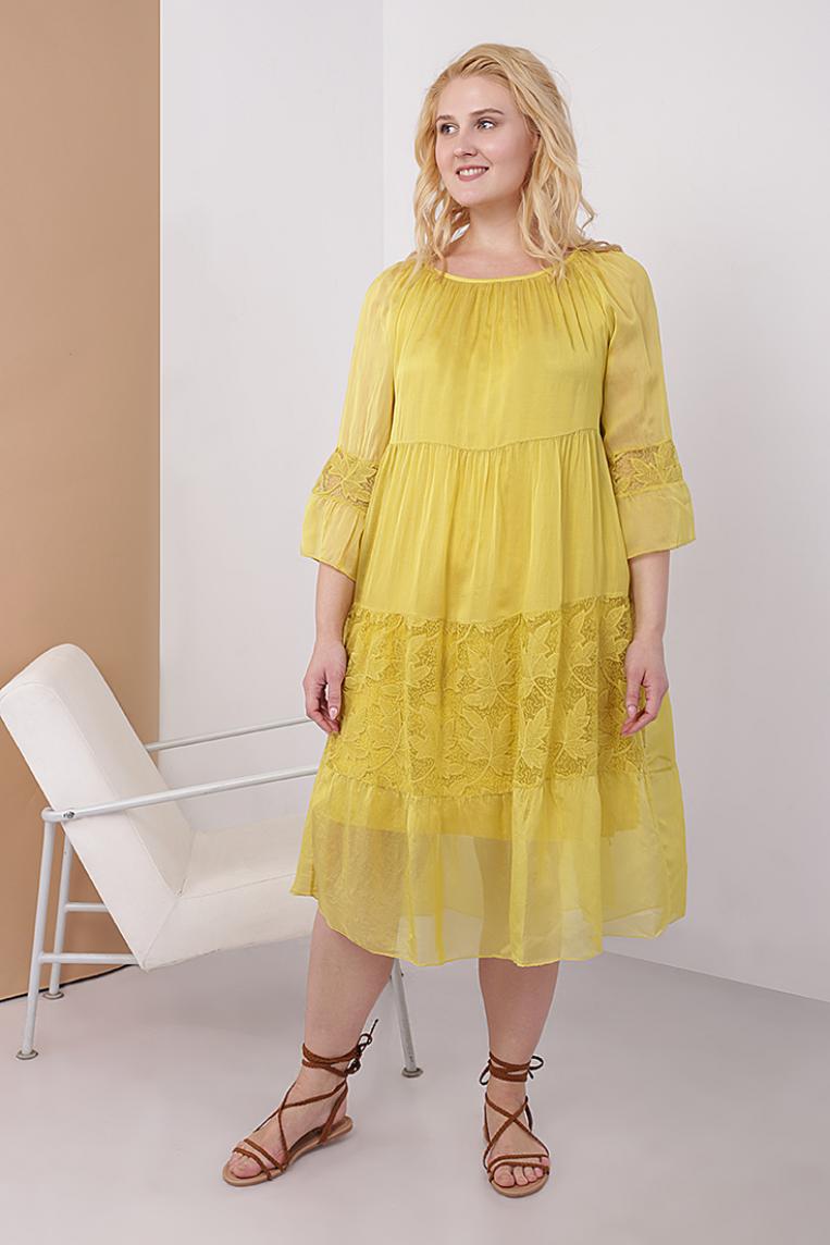 Шелковое платье от New Grinta желтого цвета 