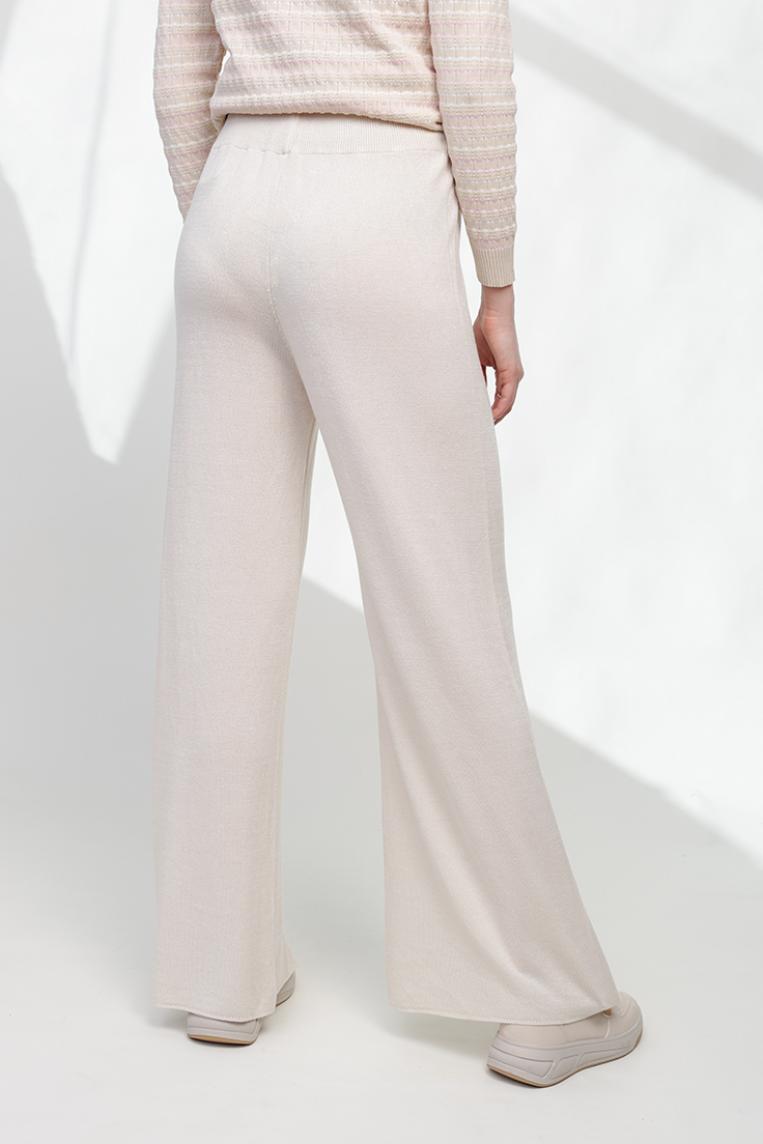Трикотажные широкие брюки клеш бежевого цвета от Made in Italy