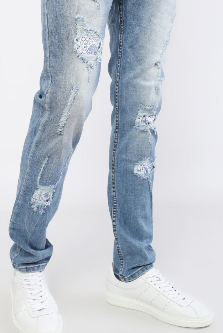 Рваные джинсы BRUNO LEONI голубого цвета