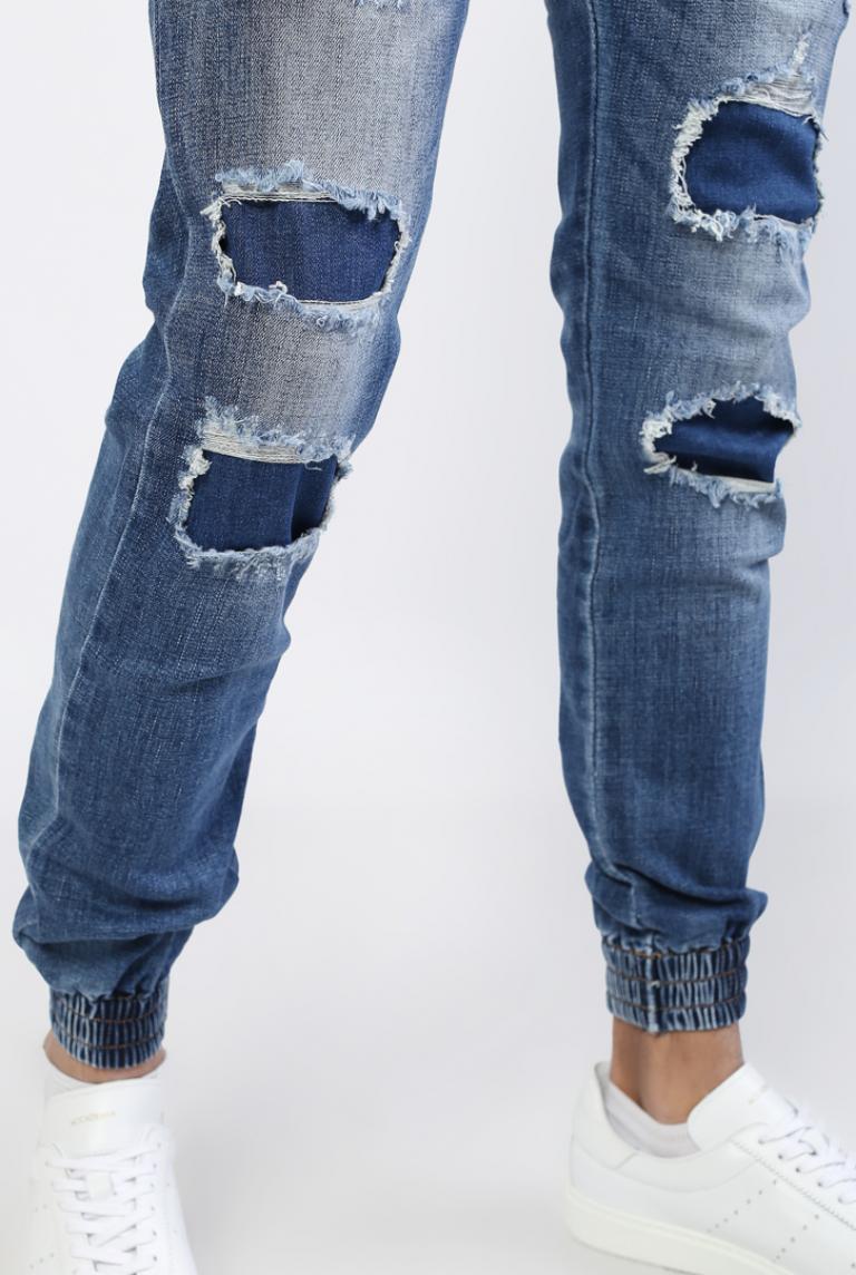 Темные рваные джинсы BRUNO LEONI